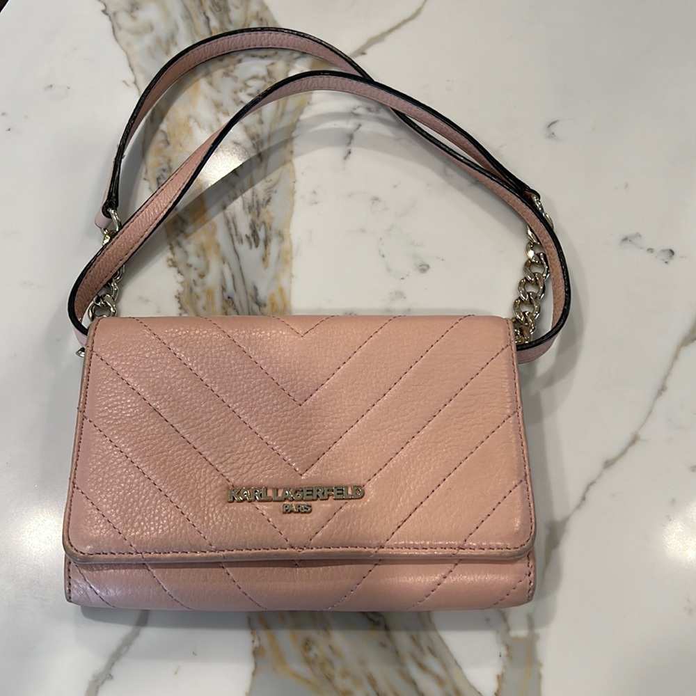 the bag Karl Lagerfeld  is light pink